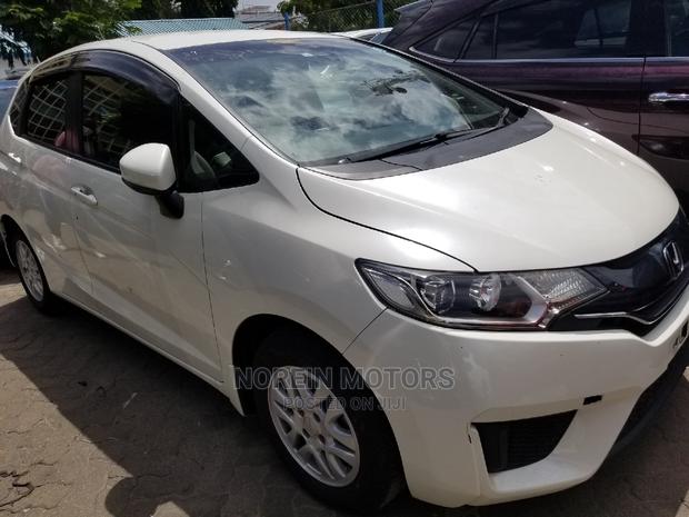 White Honda Fit 2015: Economical and Eco-friendly!