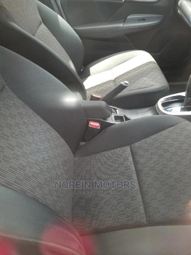 White Honda Fit 2015: Economical and Eco-friendly!