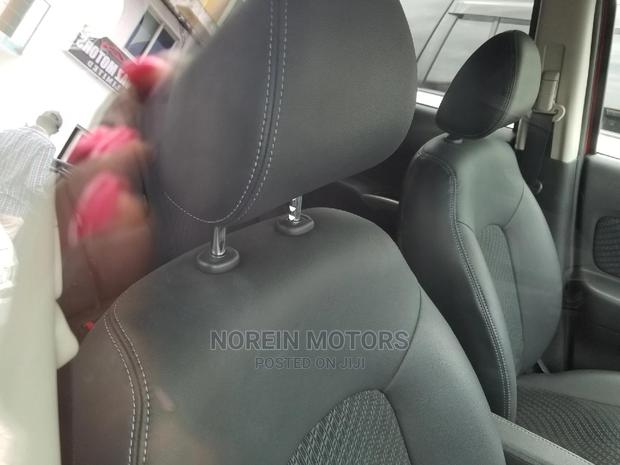 Red 2015 Nissan Note: Affordable Style and Efficiency