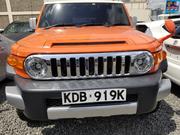 2014 Toyota FJ Cruiser Orange - Perfect for Outdoor Enthusiasts for sale