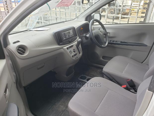 2015 Daihatsu Mira: Stylish White Hatchback, Perfect for Everyday Use