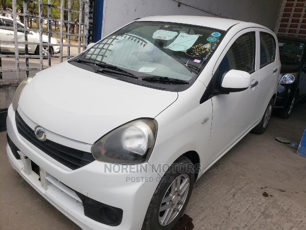 2015 Daihatsu Mira: Stylish White Hatchback, Perfect for Everyday Use