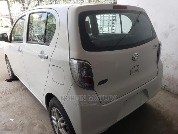 2015 Daihatsu Mira: Stylish White Hatchback, Perfect for Everyday Use