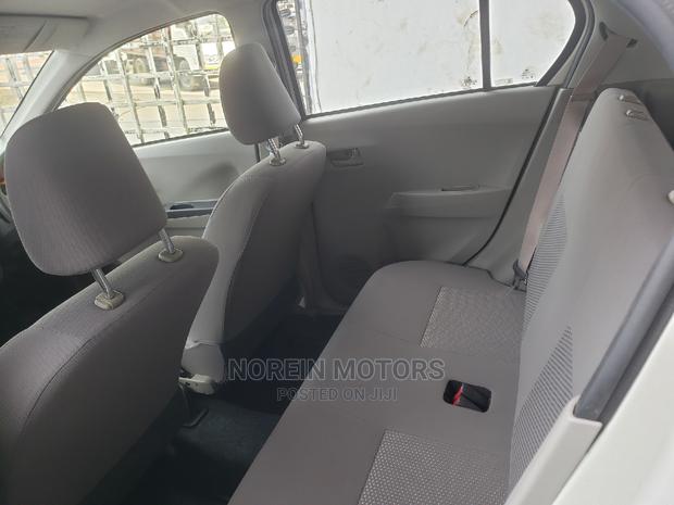 2015 Daihatsu Mira: Stylish White Hatchback, Perfect for Everyday Use