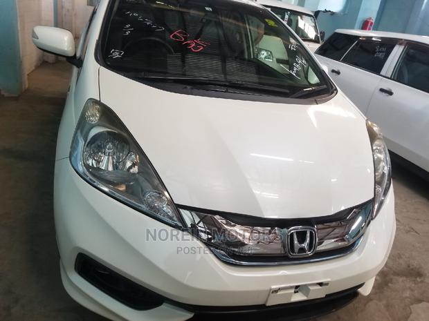 Honda Fit 2015 White - Compact, Powerful, and Affordable