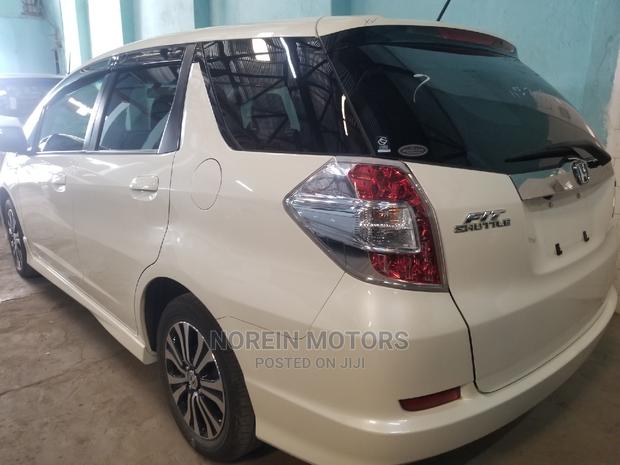 Honda Fit 2015 White - Compact, Powerful, and Affordable