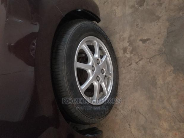 Purple Daihatsu Mira 2014: Compact Car for Sale