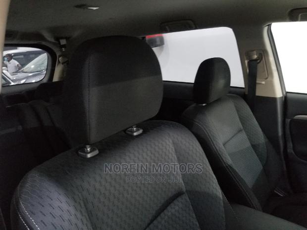 White Mitsubishi Outlander 2015 - Affordable and Spacious SUV