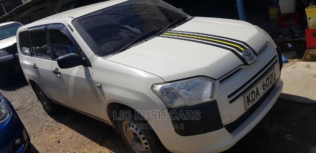 2014 Toyota Probox in White: Spacious and Efficient Compact Vehicle