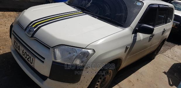 2014 Toyota Probox in White: Spacious and Efficient Compact Vehicle