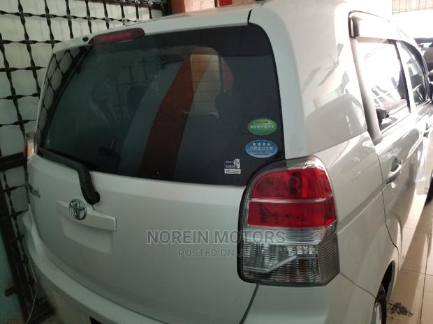 2015 Green 2015 Toyota Porte: Compact, Efficient, and Eco-Friendly
