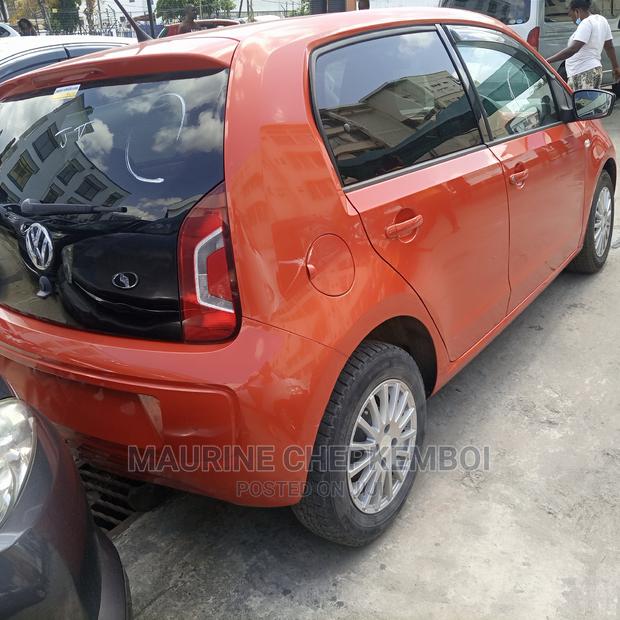 Volkswagen Up 2014 Orange