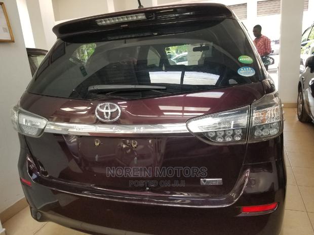 Purple 2015 Toyota Wish: Spacious, Comfortable, and Stylish Sedan