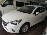 Green 2014 Mazda Demio: Compact, Stylish, and Environmentally Conscious for sale
