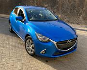 Blue 2015 Mazda Demio - Compact Car with Modern Design and Affordability for sale