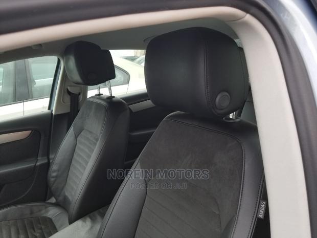 2014 Blue Volkswagen Passat: Efficient & Elegant Family Car
