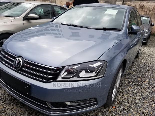 2014 Blue Volkswagen Passat: Efficient & Elegant Family Car