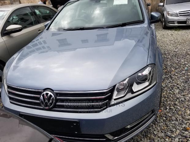 2014 Blue Volkswagen Passat: Efficient & Elegant Family Car