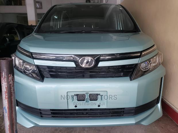 Blue Toyota Voxy 2015: Premium Minivan for a Smooth Ride