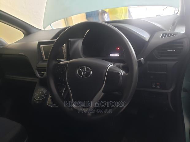 Blue Toyota Voxy 2015: Premium Minivan for a Smooth Ride