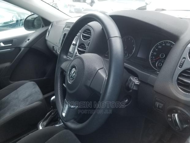 2014 Volkswagen Tiguan in White - Perfect for Urban Adventures!