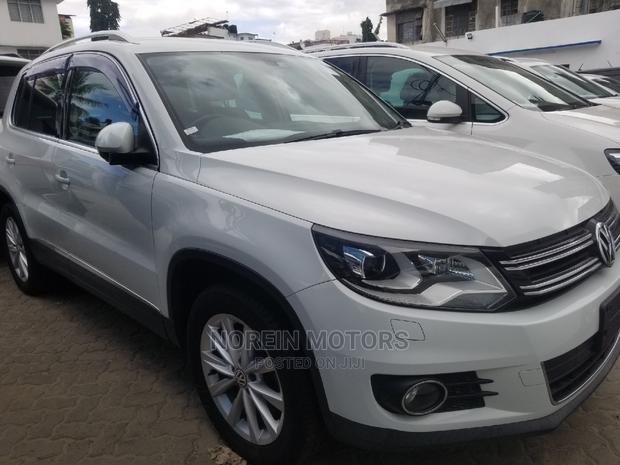2014 Volkswagen Tiguan in White - Perfect for Urban Adventures!