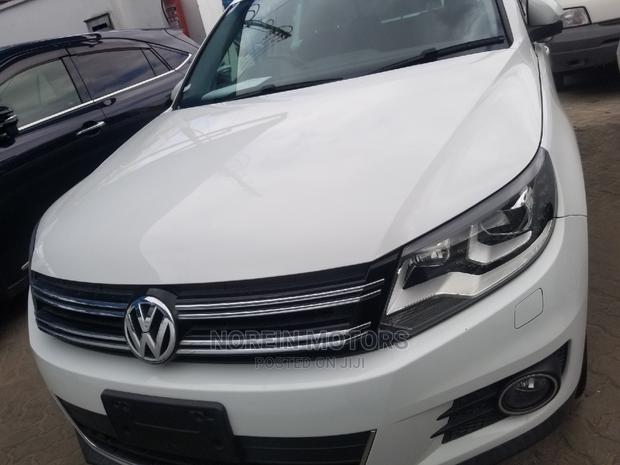 2014 Volkswagen Tiguan in White - Perfect for Urban Adventures!