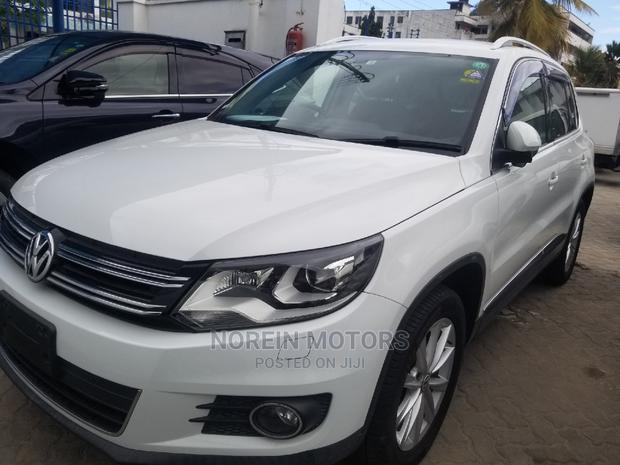 2014 Volkswagen Tiguan in White - Perfect for Urban Adventures!