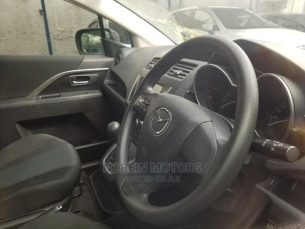 Brown Mazda Premacy 2014 - Affordable Pre-owned Option