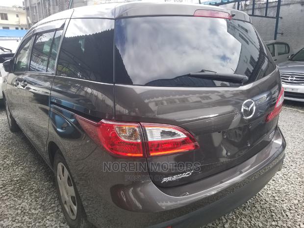 Brown Mazda Premacy 2014 - Affordable Pre-owned Option