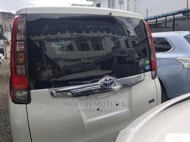 White 2015 Toyota Noah: Comfortable and Efficient Minivan