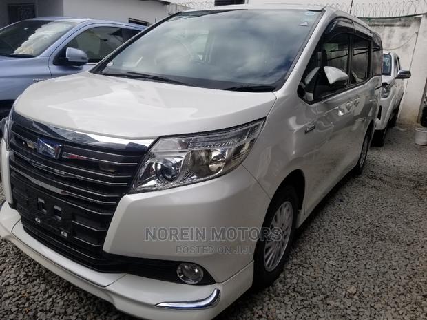 White 2015 Toyota Noah: Comfortable and Efficient Minivan