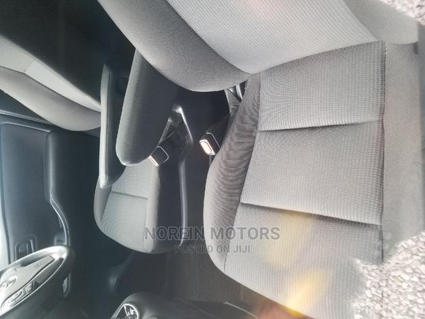 White 2015 Toyota Noah: Comfortable and Efficient Minivan