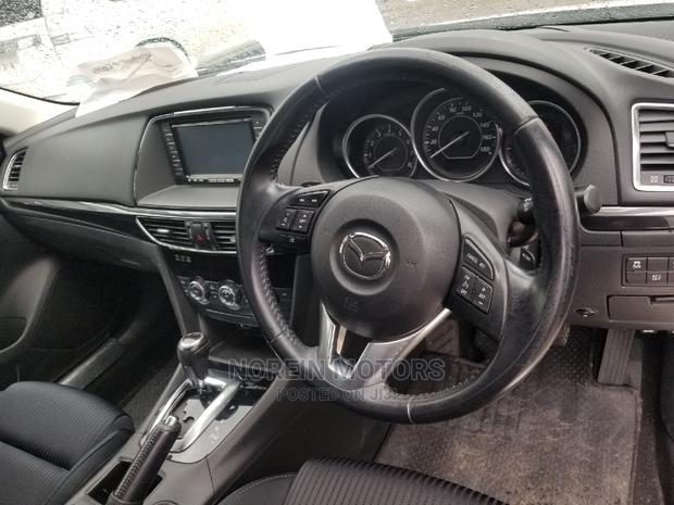 White Mazda Atenza 2015 - Spacious Sedan for Your Drive