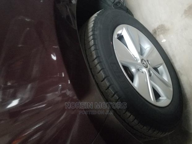 Purple Toyota Harrier 2014: Stylish and Spacious SUV