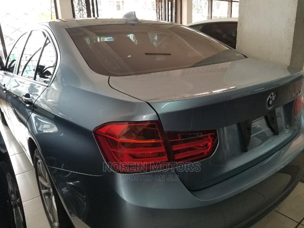 2014 Blue BMW 320i Sedan - Pre-owned