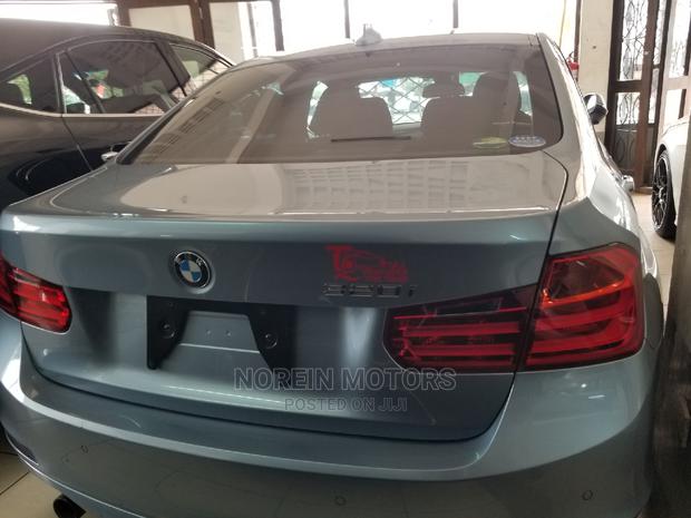 2014 Blue BMW 320i Sedan - Pre-owned