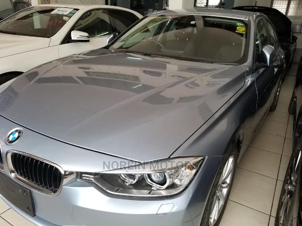 2014 Blue BMW 320i Sedan - Pre-owned