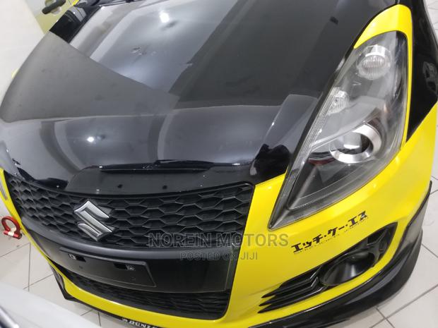 Yellow 2015 Suzuki Swift - Stylish Compact Car Available