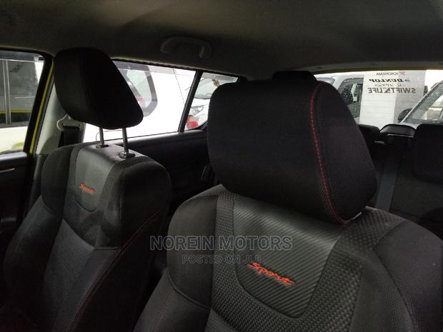 Yellow 2015 Suzuki Swift - Stylish Compact Car Available
