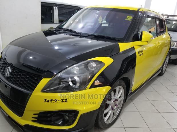 Yellow 2015 Suzuki Swift - Stylish Compact Car Available