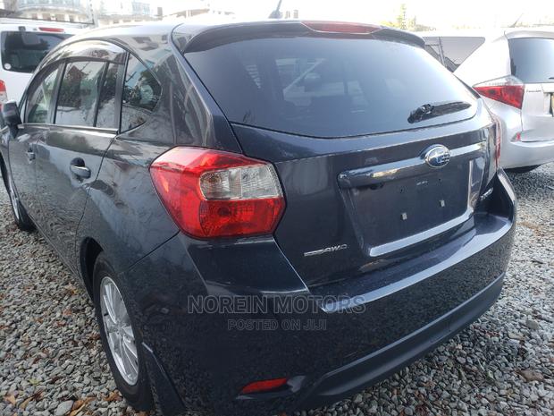 2014 Subaru Impreza - Gray, Pre-Owned, and Ready for You