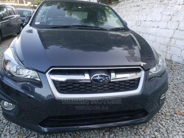 2014 Subaru Impreza - Gray, Pre-Owned, and Ready for You