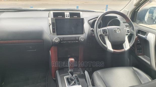White 2016 Toyota Land Cruiser Prado: Affordable, Reliable, and Stylish