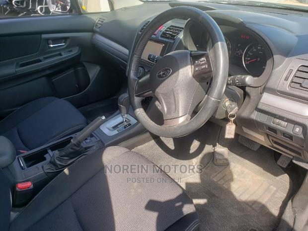 Used 2014 Subaru Impreza in Purple: Sporty Compact Car with Style