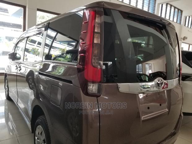 2015 Brown Noah Toyota: Affordable and Spacious Family-Friendly Minivan