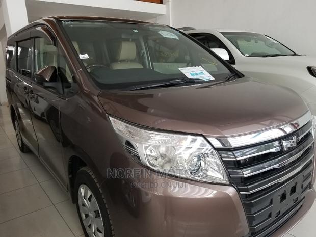 2015 Brown Noah Toyota: Affordable and Spacious Family-Friendly Minivan