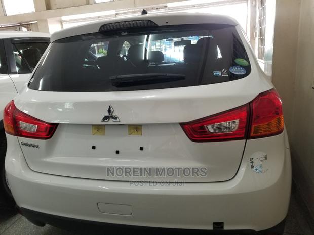 White Mitsubishi RVR 2014: Compact and Spacious SUV for Sale