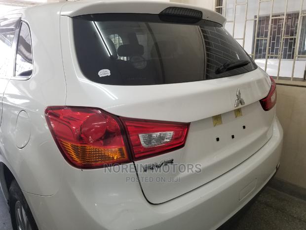 White Mitsubishi RVR 2014: Compact and Spacious SUV for Sale