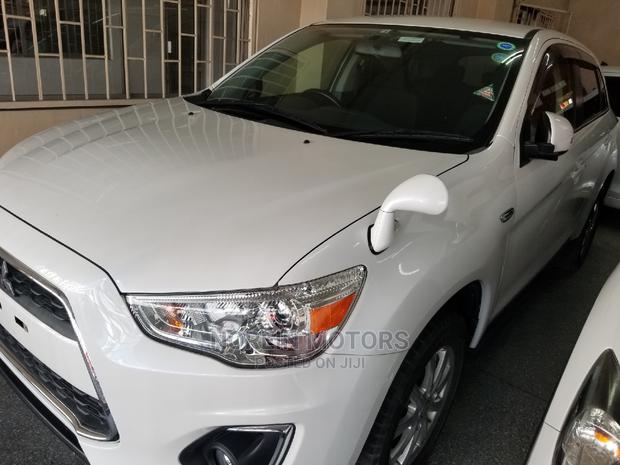 White Mitsubishi RVR 2014: Compact and Spacious SUV for Sale